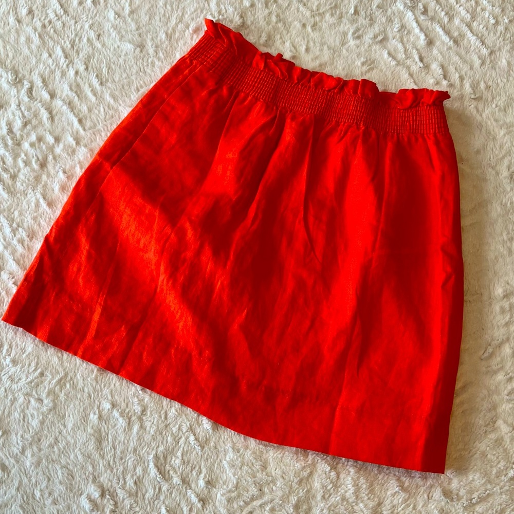 100% Linen Rich Orange Skirt with Pockets. New, size small.